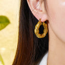Wholesale Stainless Steel Golden Earrings for Women - European and American - style Light Luxury Titanium Steel Twisted C - shaped Ear Hoops