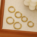 Brand X Retro Gold Titanium Steel Earrings, Embossed Circle Hoops, Minimalist Stylish Fade-Resistant Ear Cuffs for Women