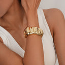 Niche Design Fashion Irregular Smooth Pleated Bracelet - Light Luxury Spring Clasp Wristband with High-End Aesthetic