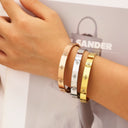 Lucky Four-Leaf Clover Shiny Zircon-Embedded Cross-Border Bracelet - Couples & Women's Light Luxury, Fade-Resistant, Fashion Versatile Titanium Steel Bangle