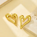 Women's Stainless Steel Earrings: Internet - Famous Hollow Heart Studs, Cold - Style, Trendy & Versatile, Creative Line - Shaped Heart Design