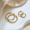 Brand X Retro Gold Titanium Steel Earrings, Embossed Circle Hoops, Minimalist Stylish Fade-Resistant Ear Cuffs for Women