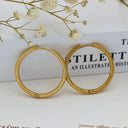 Brand X Retro Gold Titanium Steel Earrings, Embossed Circle Hoops, Minimalist Stylish Fade-Resistant Ear Cuffs for Women