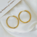 Brand X Retro Gold Titanium Steel Earrings, Embossed Circle Hoops, Minimalist Stylish Fade-Resistant Ear Cuffs for Women