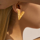 Bulk Trendy Jewelry: Stainless Steel Stud Earrings with Metallic Irregular Geometric Dot Pattern, Niche Versatile Design