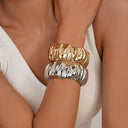 Niche Design Fashion Irregular Smooth Pleated Bracelet - Light Luxury Spring Clasp Wristband with High-End Aesthetic