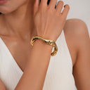 Women's Artisanal Wave Bracelet - Irregular Design, High-Shine Finish, Light Luxury Aesthetic