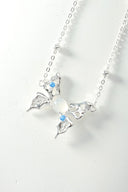 Niche Moonstone Blue Zircon Sterling Silver Necklace - Artistic Cross Design, Vintage Statement Jewelry for Women