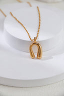 Niche Horseshoe Sterling Silver Necklace - Gold-Tone Minimalist Design, Lucky Statement Jewelry for Women