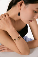 Niche Floral Charm Sterling Silver Bracelet - Gold-Tone Minimalist Elegant Design, Statement Jewelry for Women